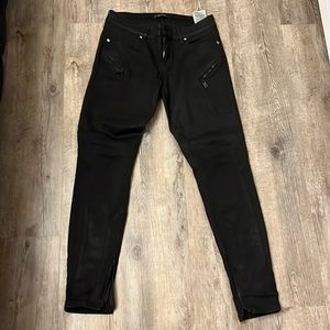 Guess coated black stretchy jeans sz. 29, low rise